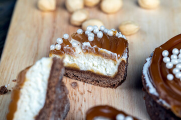 chocolate tartlet with cream filling and salted caramel with nuts