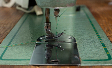 old sewing machine in the table