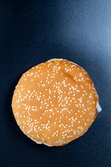 sesame bun sandwich with meat and vegetables