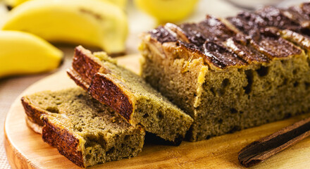 long banana cake made with organic banana, cinnamon and oatmeal, sliced. Brazilian homemade cake