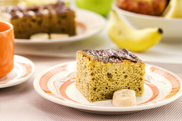 slice of vegan banana cake, made with fruits, banana flavor, with cinnamon and oatmeal.