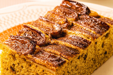 vegan banana bread or cake made with organic banana, cinnamon and oatmeal. Traditional homemade cake from Brazil, sold in bakeries