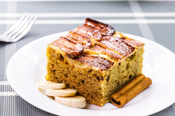slice of vegan banana cake, made with fruits, banana flavor, with cinnamon and oatmeal.