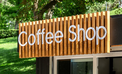 Outdoor Coffee Shop signage in summer day