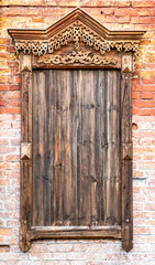 Installation in the form of an old window on a brick wall