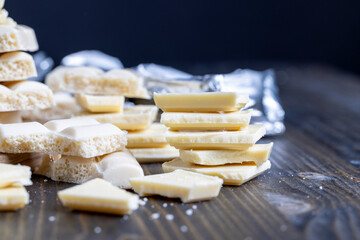 white porous chocolate on a wooden table
