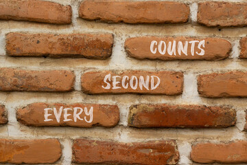 Every second counts symbol. Concept words Every second counts on red bricks on a beautiful brick wall background. Business, motivational and every second counts concept. Copy space.