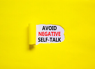 Avoid negative self-talk symbol. Concept words Avoid negative self-talk on a beautiful yellow background. Psychological and Avoid negative self-talk concept. Copy space.