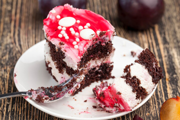 Fototapeta na wymiar sweet layered red cake with cherry flavor