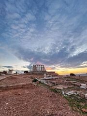 The Temple of Poseidon at Cape Sounion at sunset, over the Aegean Sea, Greece