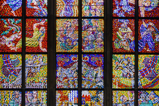Stained glass windows of St. Vitus Cathedral in the Prague, Czech Republic 18 May 2022