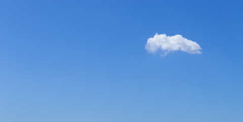 blue sky with lonely cloud