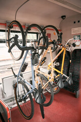 06.01.2022 Gdynia Poland Europe. Concept of public transportation with bike commuting. Bicycles parked inside the train. Bike rack in the railway transport.