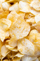 scattered potato chips with natural spices