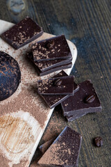 broken into pieces of milk and dark chocolate bars