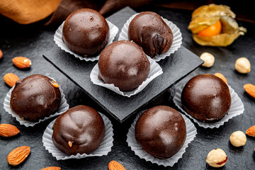Chocolates with nuts in the shape of a ball