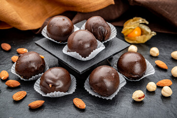 Chocolates with nuts in the shape of a ball
