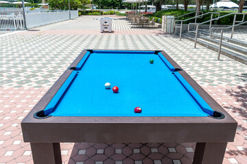 Outdoor green pool table