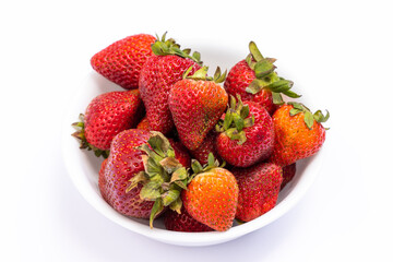 Bowl of strawberries on a white background