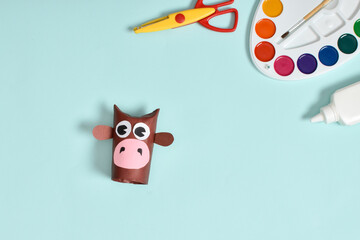 Diy. Bull with his own hands from a sleeve of toilet paper and colored paper. Step-by-step photo instruction.