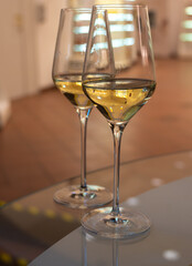 Tasting of brut champagne sparkling wine produced by traditional method in underground caves