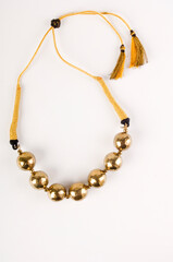 Fototapeta premium golden necklace isolated on white background