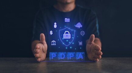 Personal Data Protection Act or PDPA concept. Businessman hands holding virtual screen of PDPA...