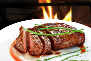 Barbecue steak on charcoal over high heat
