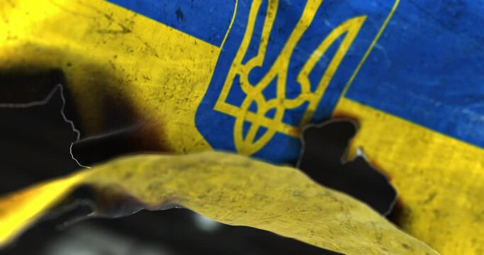 Ukrainian used damaged flag waving on the wind. Symbol of resistance and victory, fight against russian agression.