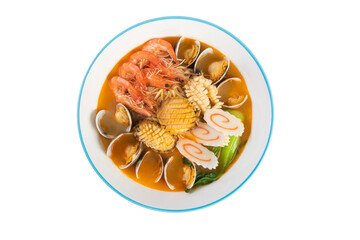 Noodles in soup on a plate