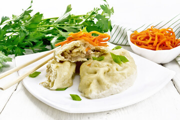 Patties pegodi with spicy carrots in plate on board