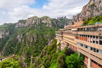 View of the mountains of Montserrat, Spain, with the monastery, cable car and other buildings in...