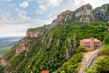 Fototapeta na wymiar View of the aerial tramway cable car to Montserrat Abbey and Monastery in the Montserrat mountain range near Barcelona in Southern Spain.