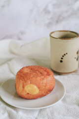 Doughnuts with Creamy Lemon Filling Dusted on white background. copy space for your text. Snack food and dessert.