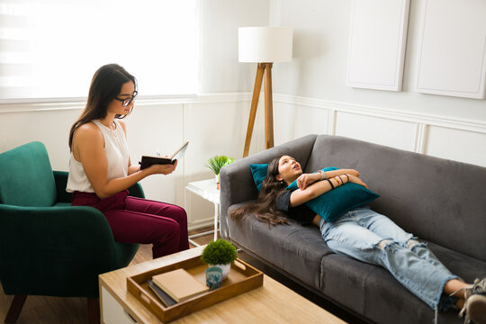Therapist treating a teen girl