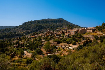 Fototapeta na wymiar photography of the city of Valldemosa from the hillside above the road during a sunny afternoon on the island of Mallorca