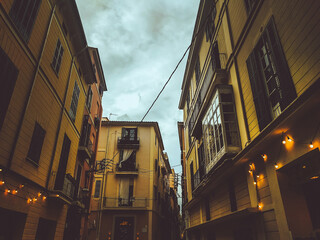 Old building facade, Palma de Mallorca, Spain. Old windows closeup of building in Spain. Facade of an ancient building