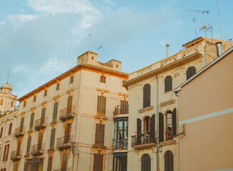 Old building facade, Palma de Mallorca, Spain. Old windows closeup of building in Spain. Facade of an ancient building