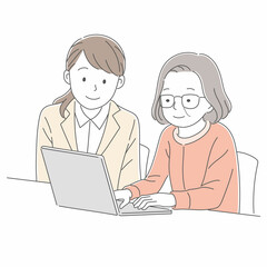 パソコンの操作を教える講師と笑顔の女性