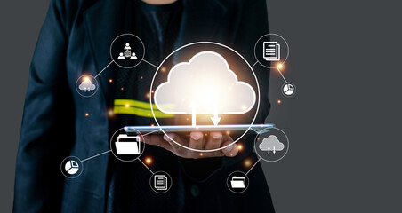 Businesswoman using tablet showing cloud computing diagram in hand cloud technology data storage...