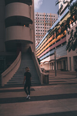 people walking in the city woman downtown miami buildings colors 