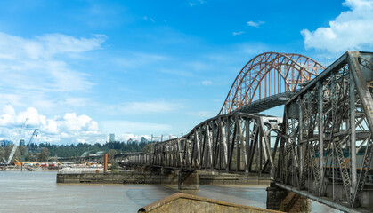 New Westminster Rail Bridge or Fraser River Swing Bridge. Pattullo Bridge behind the bridge. British Columbia, Canada.