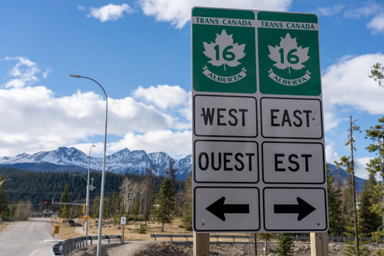 Jasper, Alberta, Canada - May 1 2021 : Road sign of Trans-Canada Highway 16, Yellowhead Highway, Alberta Provincial Highway No. 16. Canadian Rockies.