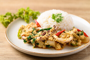 Thai stir fried curry squid and cooked rice, Thai food