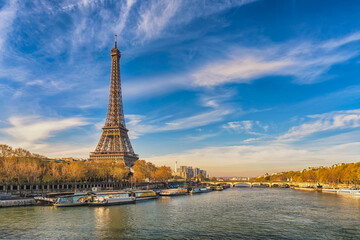 Paris France city skyline at Eiffel Tower and Seine River Jena Bridge