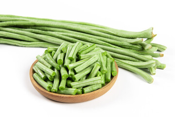 slice of long bean or cowpea in a plate on white background