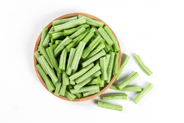 slice of long bean or cowpea in a plate isolated on white background