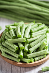 slice of long bean or cowpea in a plate on table