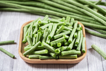 slice of long bean or cowpea in a plate on table