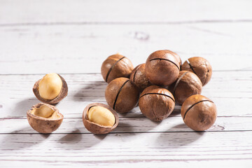 Macadamia nuts on wooden table